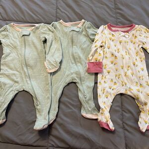 Newborn size cloud is three pack, footed, cotton pajama